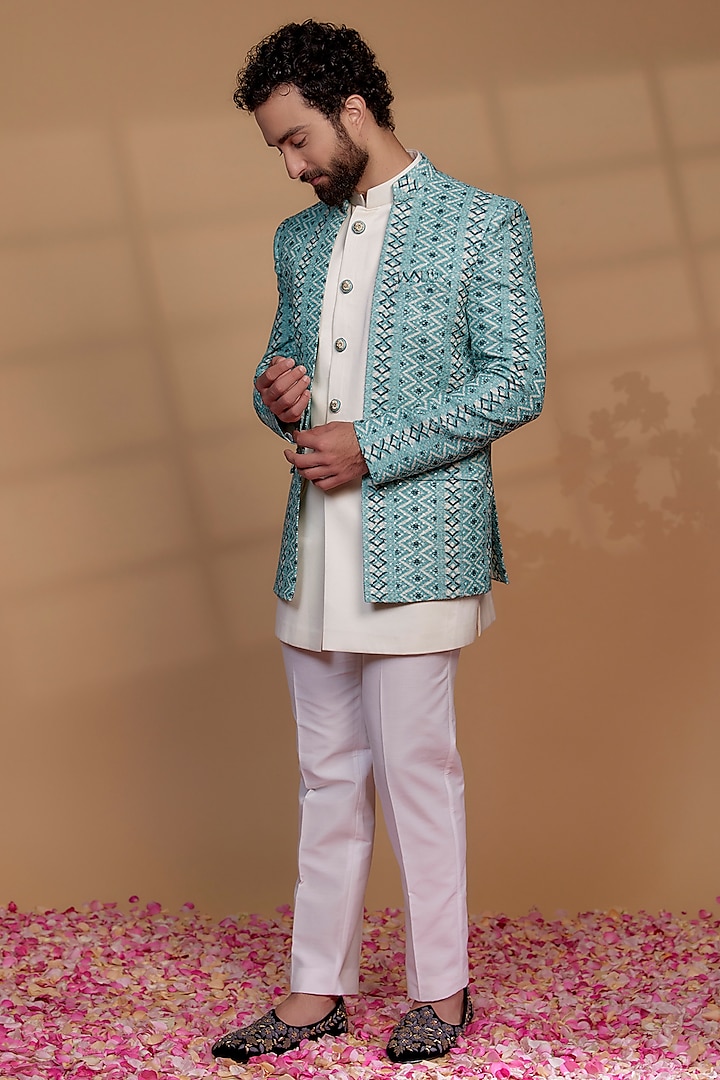 Turquoise Blue Silk & Imported Suiting Fabric Indowestern Set by RIYAASAT