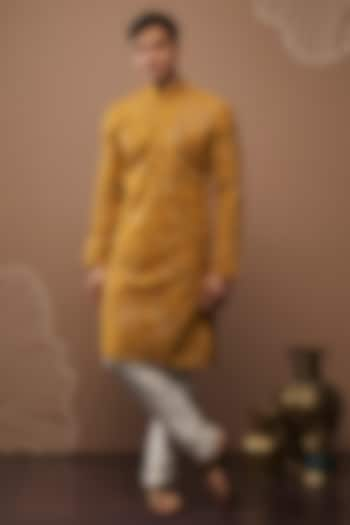 Mustard Yellow Silk Hand & Machine Embroidered Kurta Set by RIYAASAT