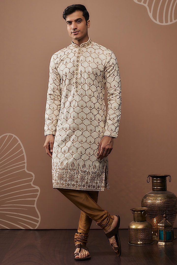 Beige Hand & Machine Embroidered Kurta Set by RIYAASAT