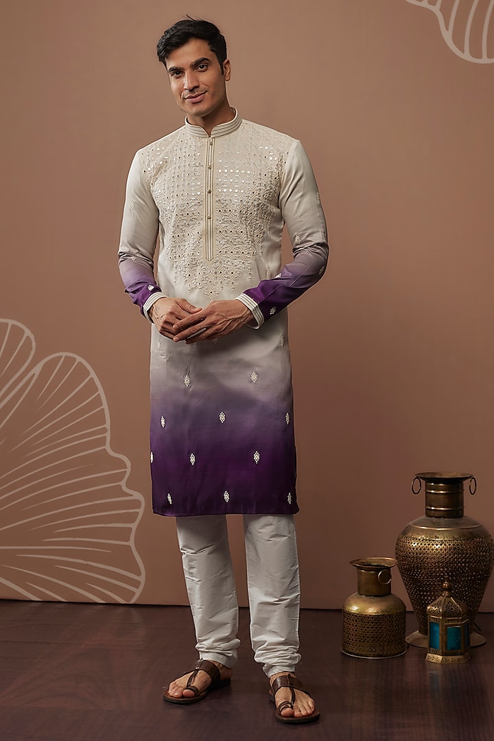 White & Purple Hand & Machine Embroidered Kurta Set by RIYAASAT