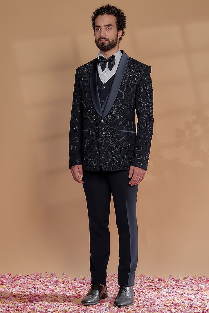 Midnight Blue Suiting Fabric Cutdana Embroidered Tuxedo Set by RIYAASAT at Pernia's Pop Up Shop