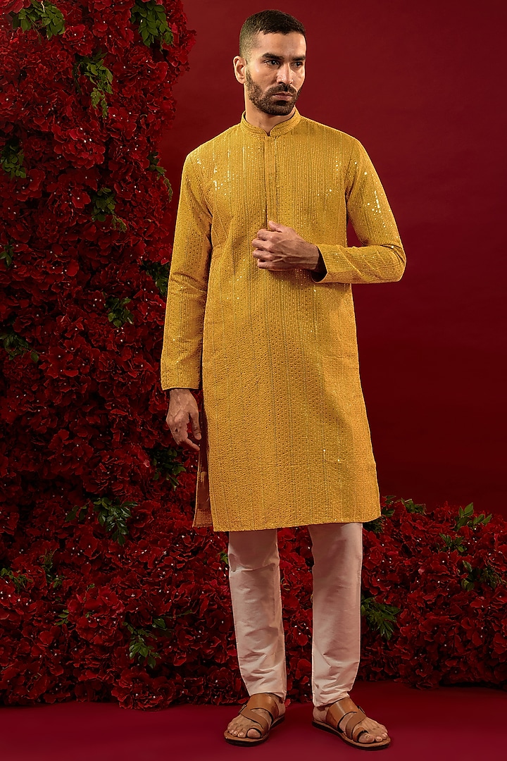 Mustard Yellow Silk Machine Embellished Kurta Set by RIYAASAT