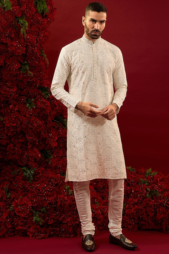 Cream Silk Hand & Machine Work Kurta Set by RIYAASAT at Pernia's Pop Up Shop