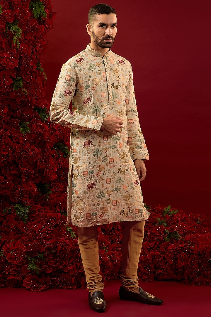 Cream Silk Machine Work Kurta Set by RIYAASAT