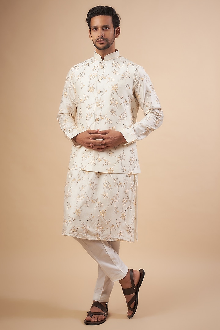 Cream Silk Embroidered Bundi Jacket Set by RIYAASAT at Pernia's Pop Up Shop