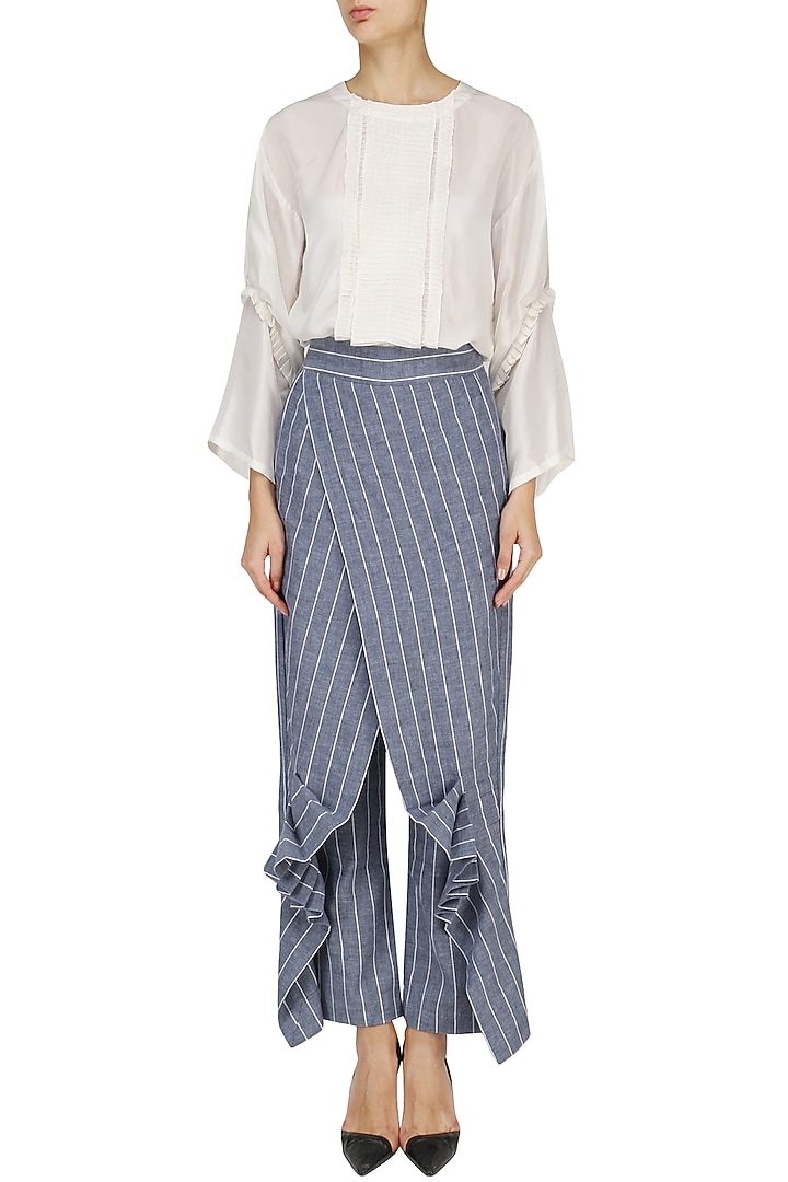 White pin tucked tunic with striped wrap pants available only at Pernia's Pop Up Shop.