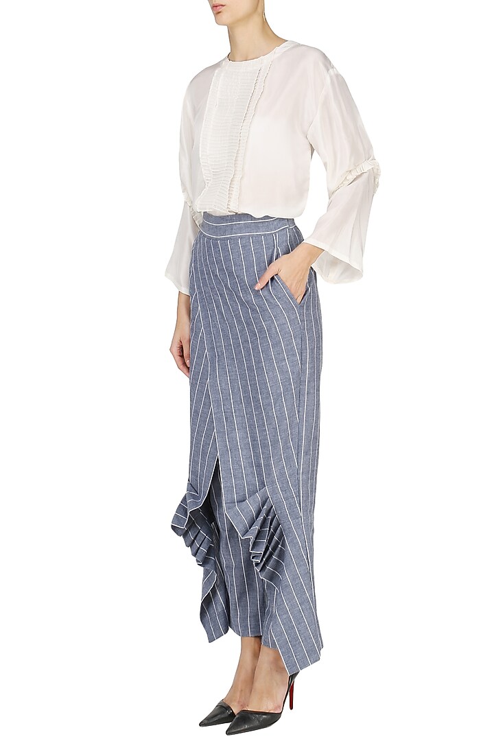 White pin tucked tunic with striped wrap pants available only at Pernia's Pop Up Shop.