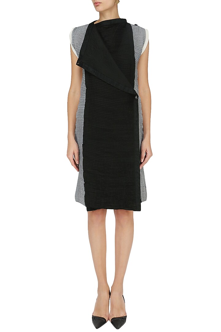 Black pintucked wrap dress available only at Pernia's Pop Up Shop.