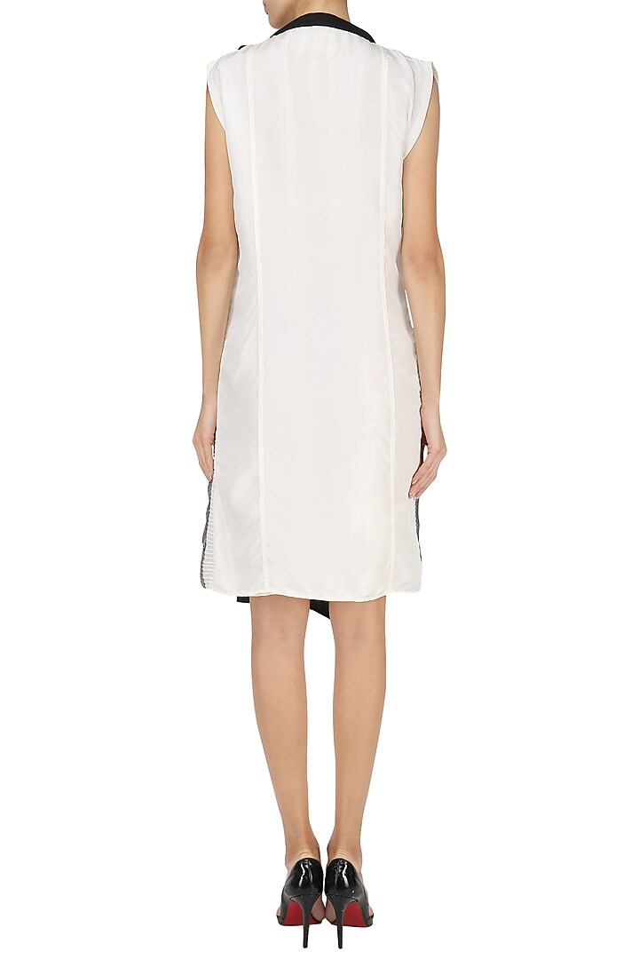 Black pintucked wrap dress available only at Pernia's Pop Up Shop.