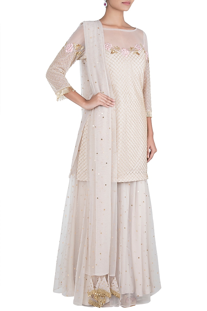 Ivory embroidered sharara set available only at Pernia's Pop Up Shop.