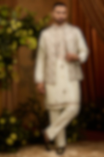 Ivory Silk Thread Embroidered Nehru Jacket Set by RIYAASAT at Pernia's Pop Up Shop