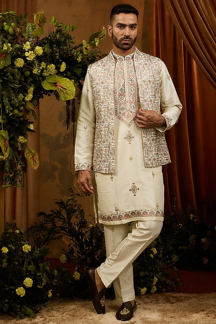 Ivory Silk Thread Embroidered Nehru Jacket Set by RIYAASAT at Pernia's Pop Up Shop
