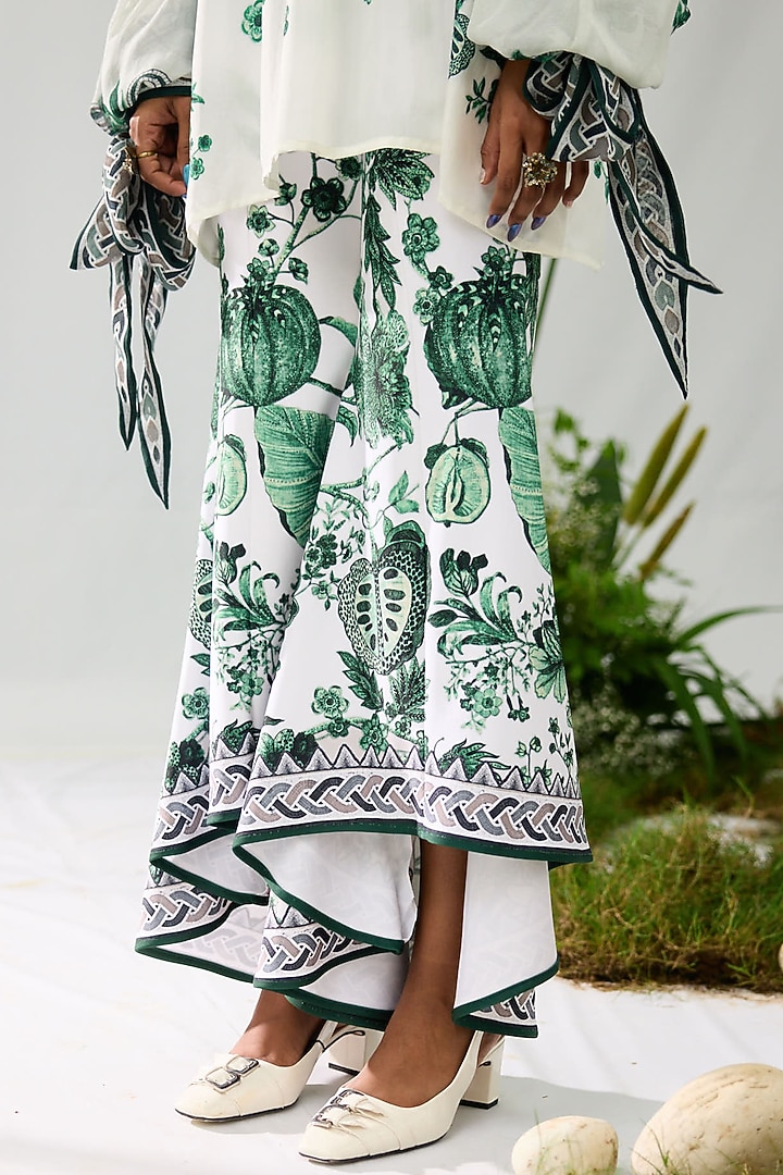 Emerald Green & White Poly Lycra High-Low Pants by Rajdeep Ranawat at Pernia's Pop Up Shop