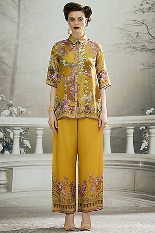 Mustard Modal Satin Printed Pants by Rajdeep Ranawat