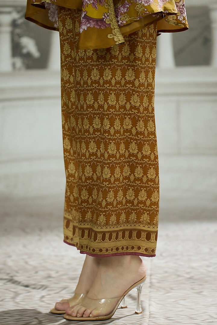 Mustard Modal Satin Printed Pants by Rajdeep Ranawat at Pernia's Pop Up Shop