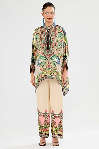 Ivory-Blush Modal Satin Printed Pants by Rajdeep Ranawat