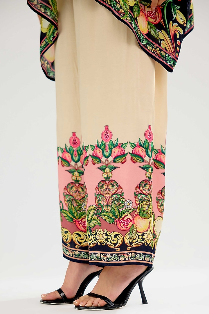 Ivory-Blush Modal Satin Printed Pants by Rajdeep Ranawat at Pernia's Pop Up Shop