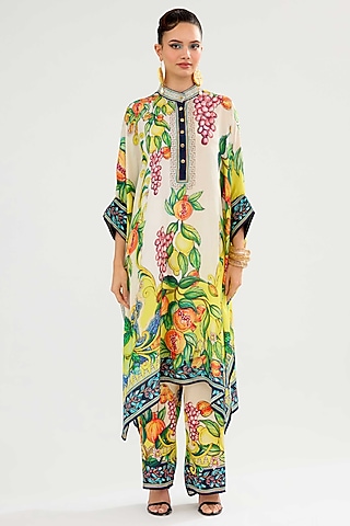 Ivory-Yellow Modal Satin Printed Pants by Rajdeep Ranawat