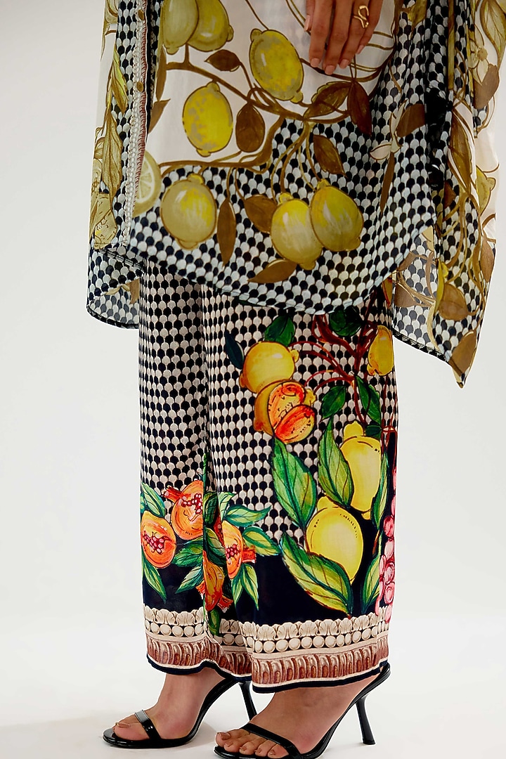 Ivory & Black Modal Satin Printed Pants by Rajdeep Ranawat at Pernia's Pop Up Shop