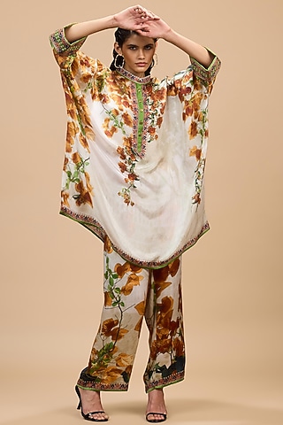Mustard & Poly Gold Modal Satin Printed Pants by Rajdeep Ranawat