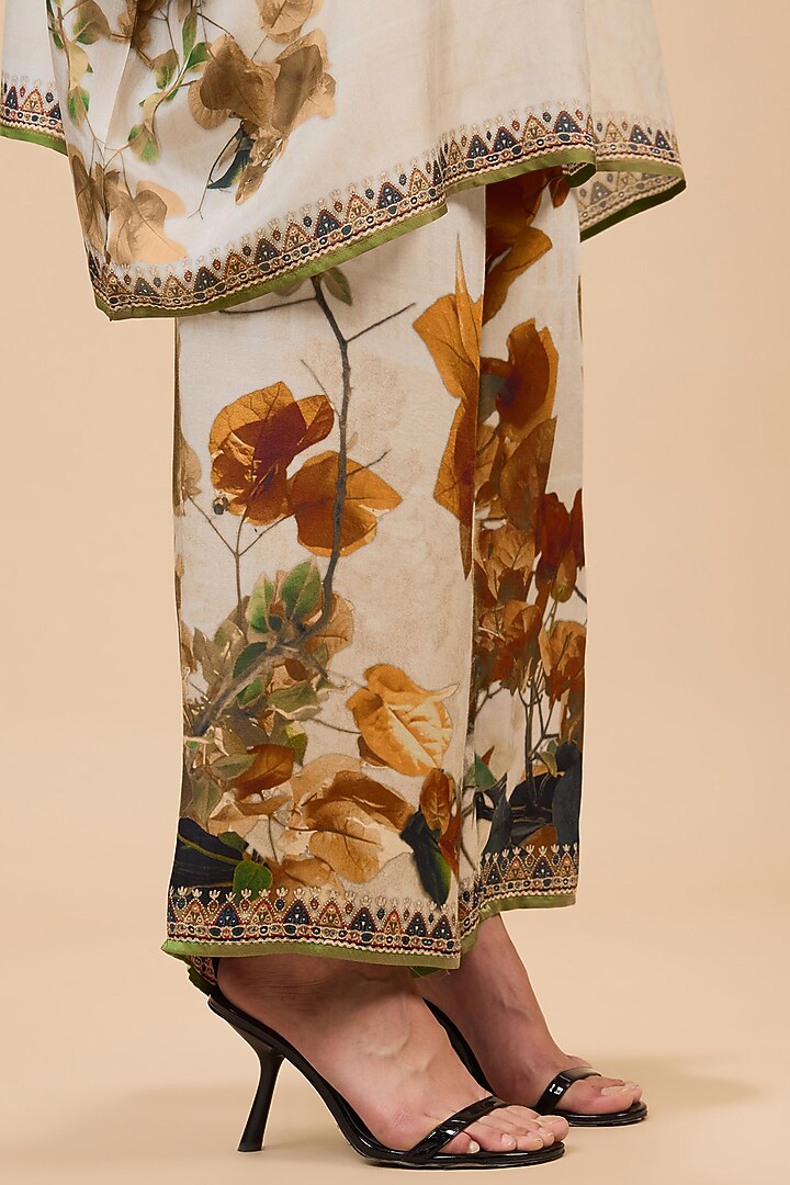 Mustard & Poly Gold Modal Satin Printed Pants by Rajdeep Ranawat at Pernia's Pop Up Shop
