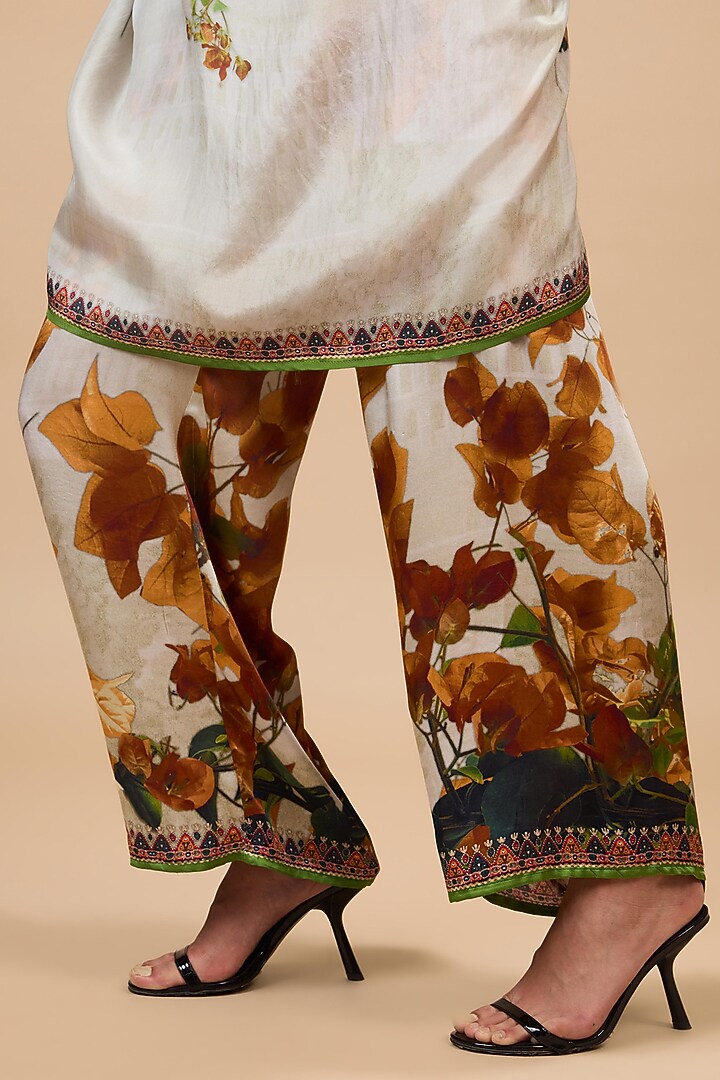 Mustard & Poly Gold Modal Satin Printed Pants by Rajdeep Ranawat at Pernia's Pop Up Shop