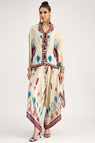 Eggshell White Modal Satin Printed Pants by Rajdeep Ranawat