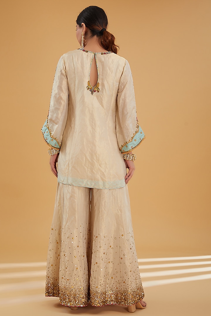 Ivory Golden Tissue Embroidered Wedding Sharara Set by Raji Ramniq at Pernia's Pop Up Shop