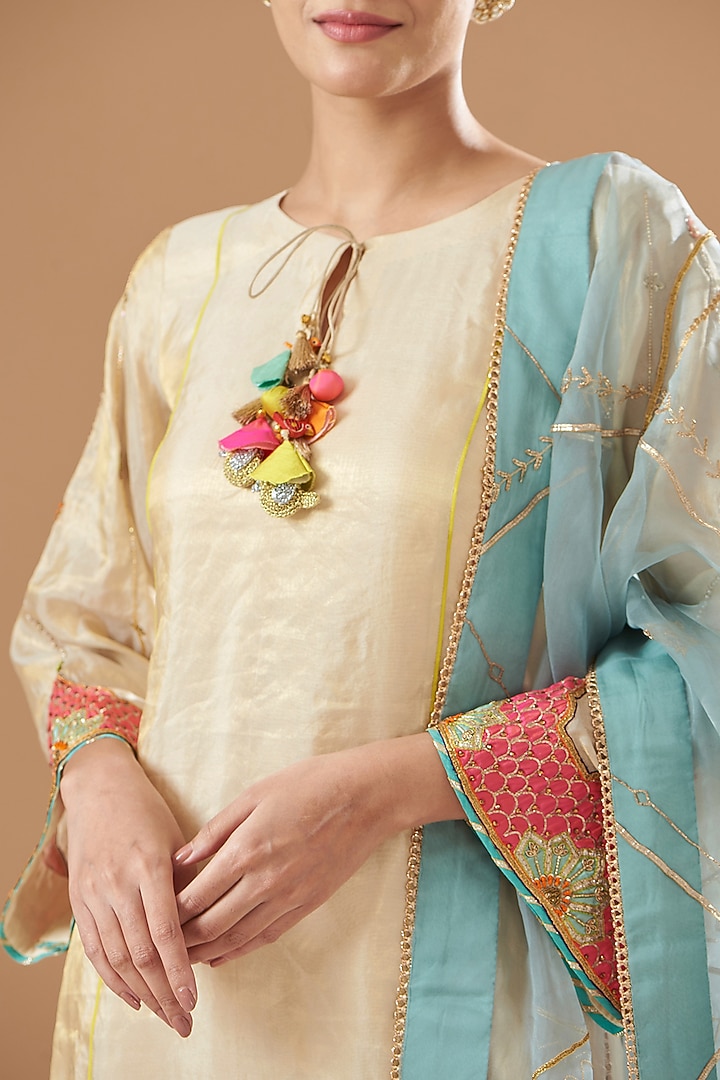 Ivory Golden Tissue Silk Embroidered Kurta Set by Raji ramniq at Pernia's Pop Up Shop