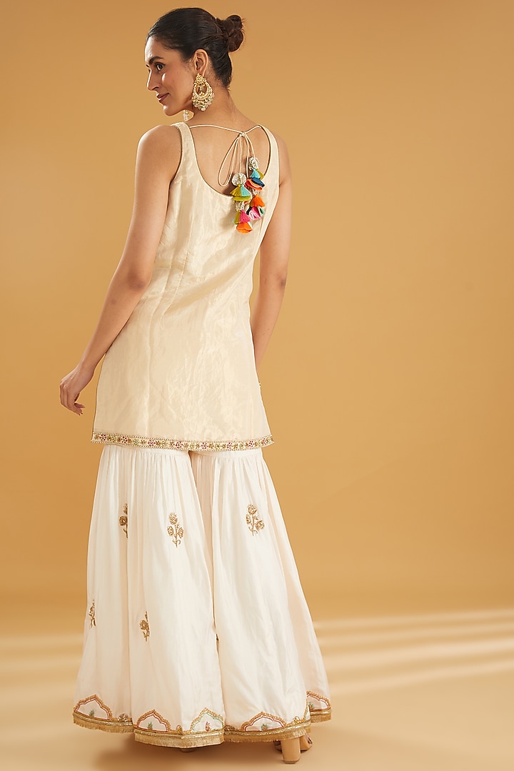 Ivory Golden Silk Hand Embroidered Gharara Set by Raji ramniq at Pernia's Pop Up Shop