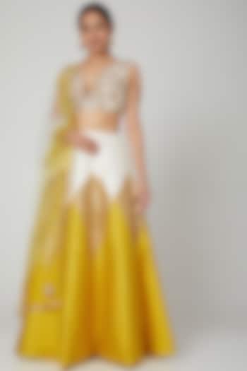 Mustard Embroidered Wedding Lehenga Set by Rajat tangri at Pernia's Pop Up Shop
