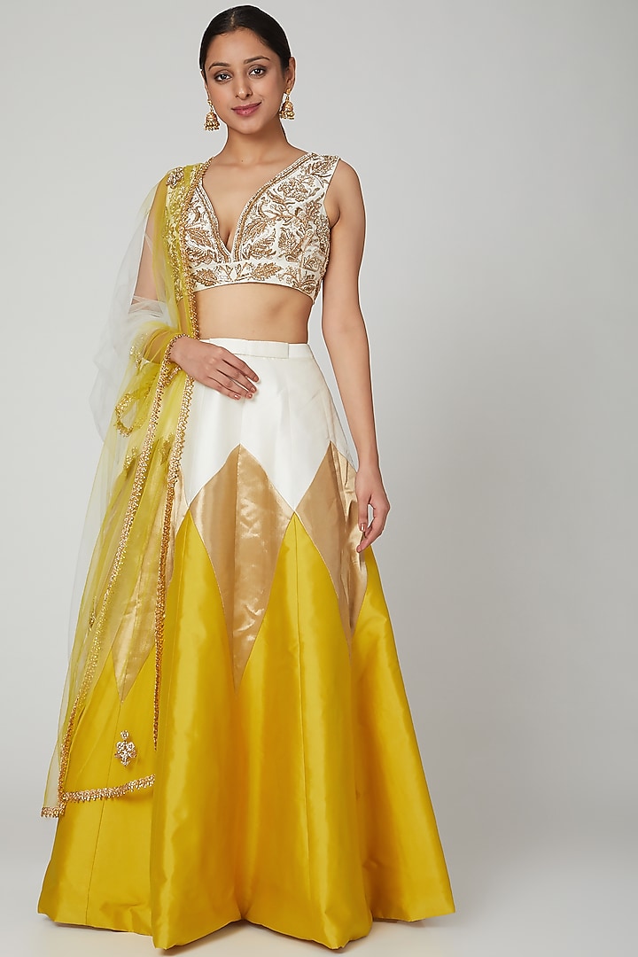 Mustard Embroidered Wedding Lehenga Set by Rajat tangri at Pernia's Pop Up Shop