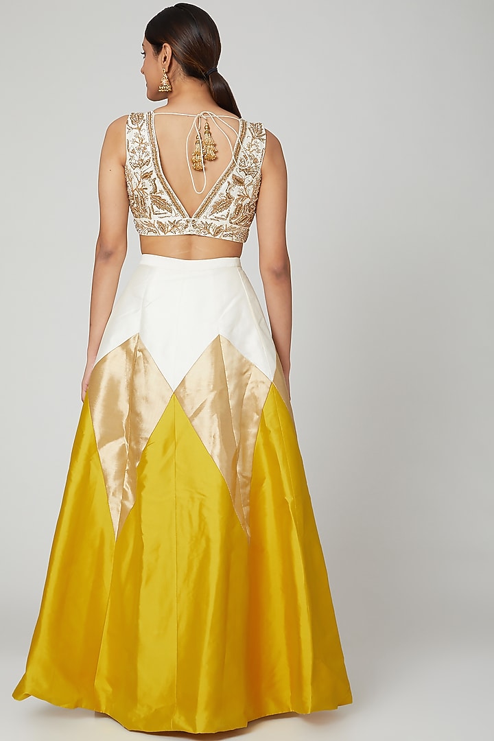 Mustard Embroidered Wedding Lehenga Set by Rajat tangri at Pernia's Pop Up Shop