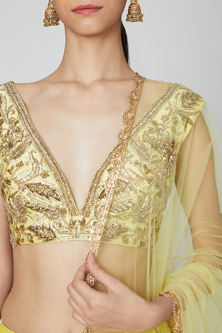Yellow Embroidered Wedding Lehenga Set by Rajat tangri  at Pernia's Pop Up Shop