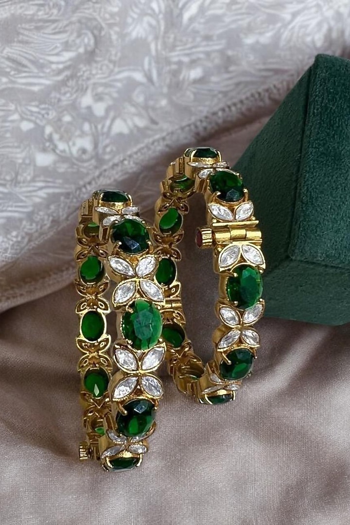 Matte Gold Plated Emerald Green Stone Adjustable Bangles (Set Of 2) by Riana Jewellery at Pernia's Pop Up Shop