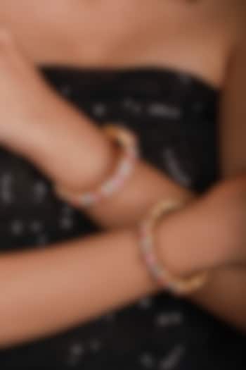 Matte Gold Plated Light Pink Stone Adjustable Floral Bangles (Set Of 2) by Riana Jewellery at Pernia's Pop Up Shop