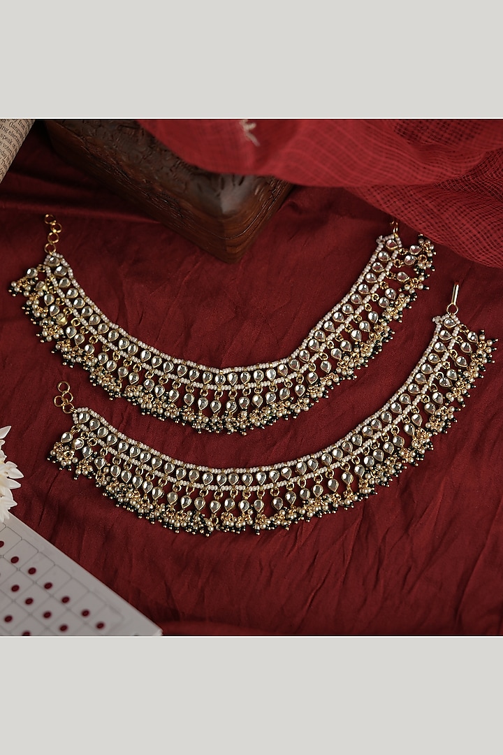Matte Gold Plated Green & White Jadtar Stone Payals (Set Of 2) by Riana Jewellery at Pernia's Pop Up Shop