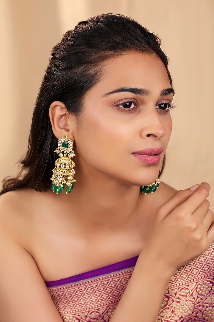 Matte Gold Plated Emerald Stone Jhumka Earrings by Riana Jewellery at Pernia's Pop Up Shop