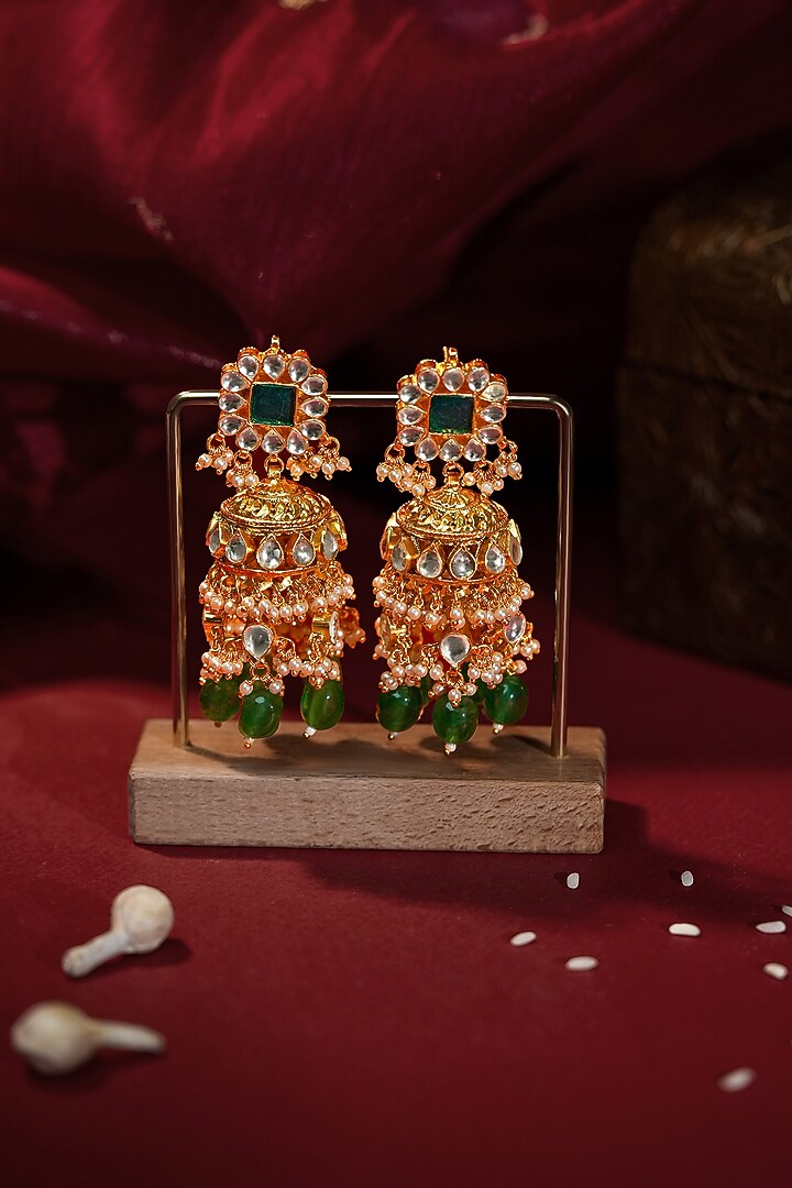 Matte Gold Plated Emerald Stone Jhumka Earrings by Riana Jewellery at Pernia's Pop Up Shop