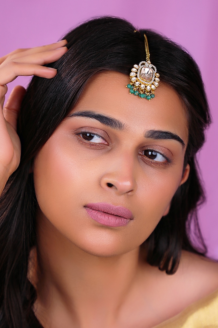 Matte Gold Plated Sea Green Moissanite Polki Maangtikka by Riana Jewellery at Pernia's Pop Up Shop
