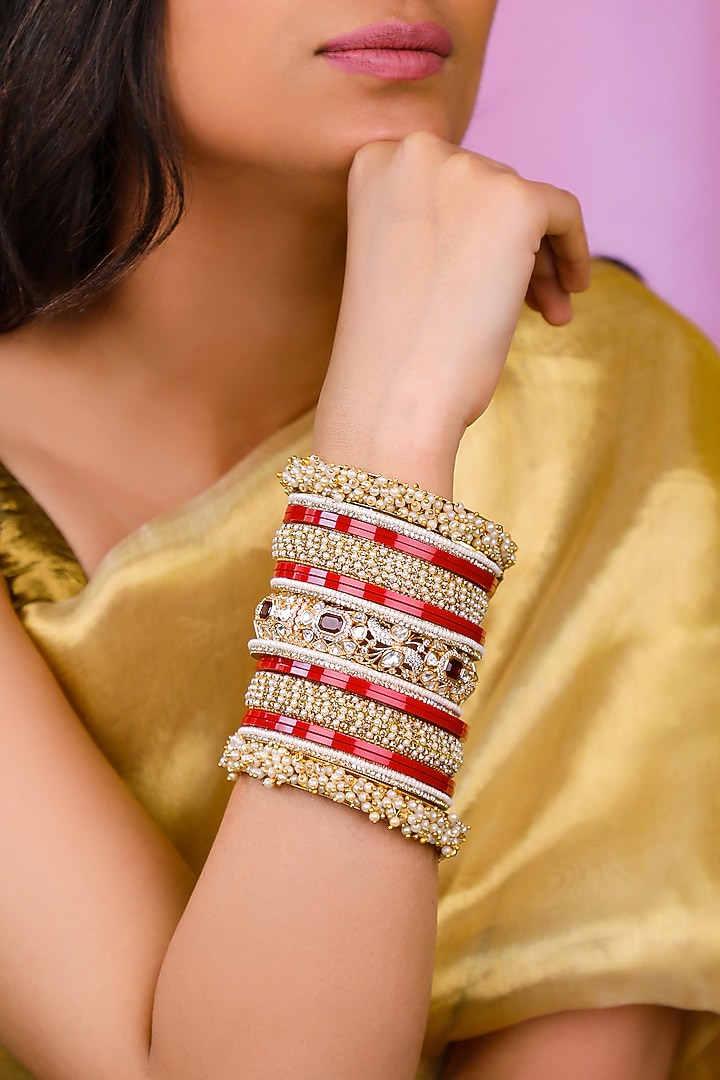 Matte Gold Plated Pearl Bangles (Set Of 21) by Riana Jewellery at Pernia's Pop Up Shop