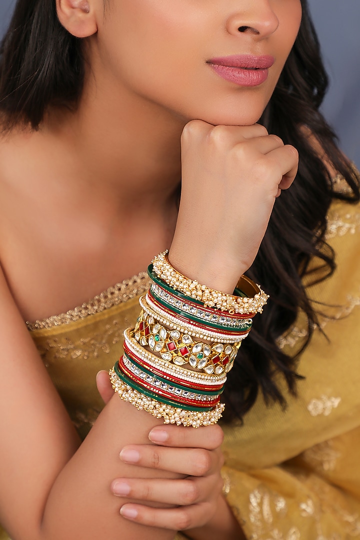 Matte Gold Plated Multi-Colored Stone Bangles (Set Of 21) by Riana Jewellery at Pernia's Pop Up Shop