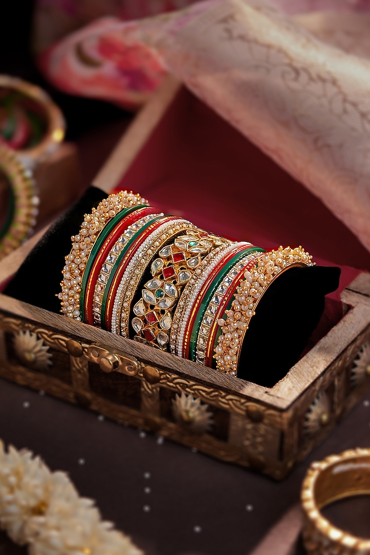 Matte Gold Plated Multi-Colored Stone Bangles (Set Of 21) by Riana Jewellery at Pernia's Pop Up Shop
