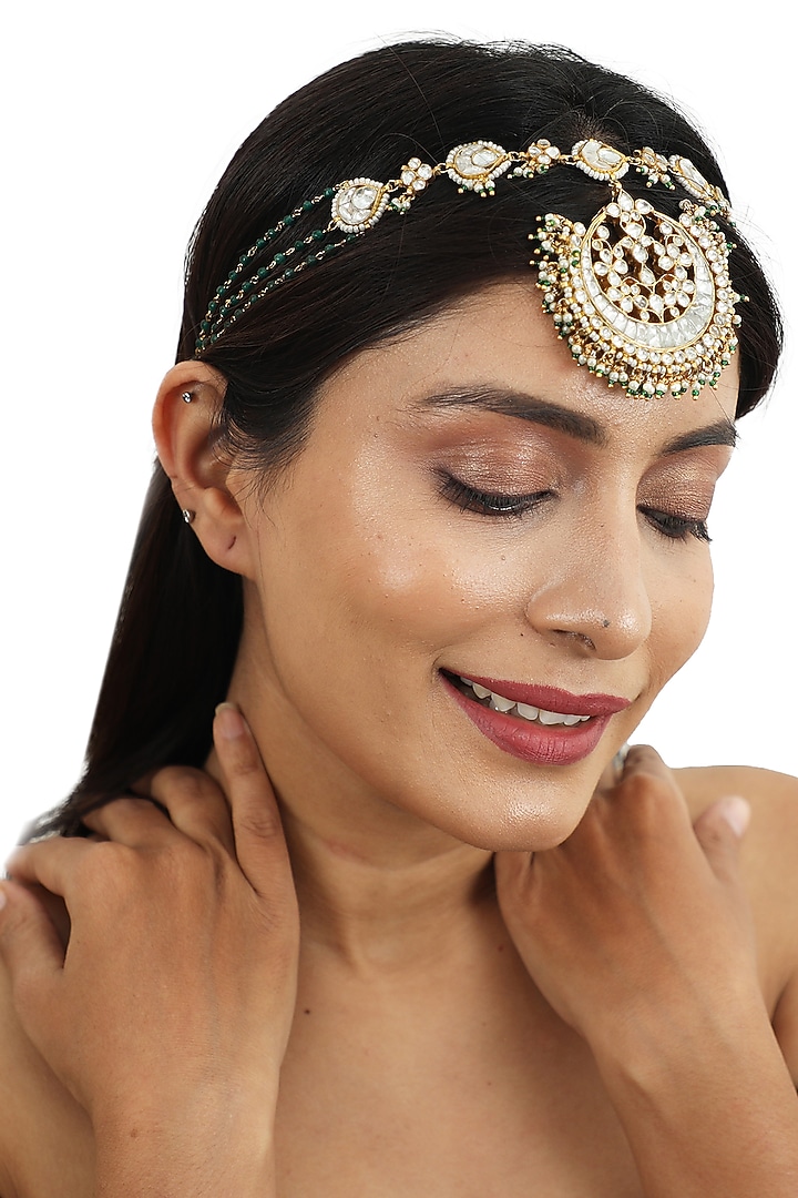Gold Plated Matha Patti With White Jadtar Stones by Riana Jewellery at Pernia's Pop Up Shop