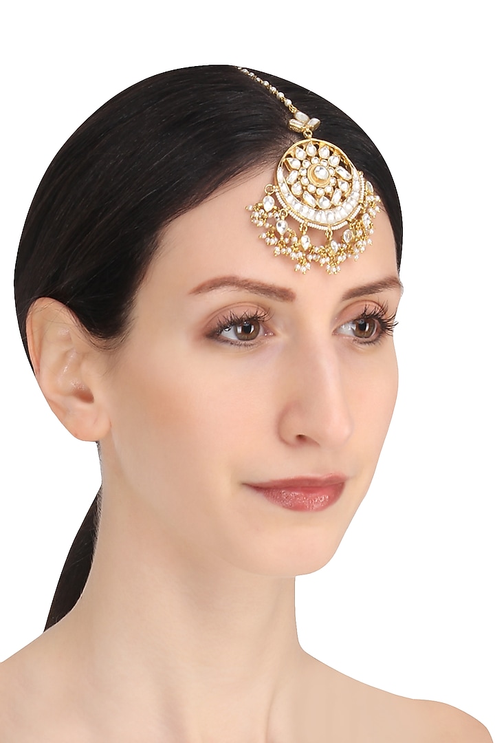 Riana Jewellery presents Gold plated white jadtar stone crescent maang tikka available only at Pernia's Pop Up Shop.