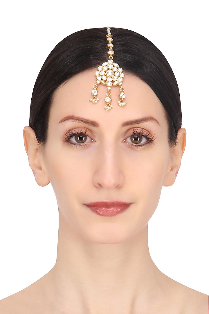 Riana Jewellery presents Gold plated white jadtar stone maang tikka available only at Pernia's Pop Up Shop.