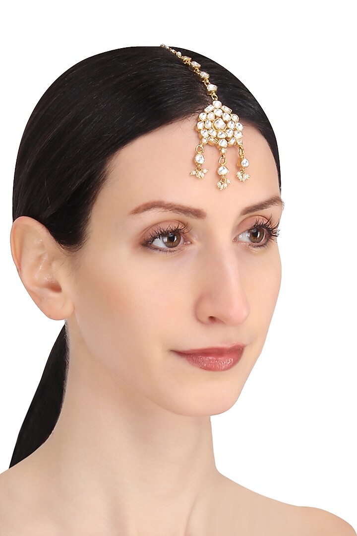 Riana Jewellery presents Gold plated white jadtar stone maang tikka available only at Pernia's Pop Up Shop.