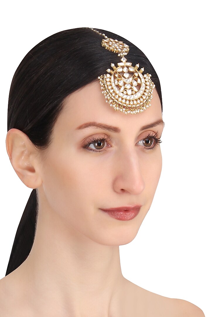 Riana Jewellery presents Gold plated round crescent maang tikkaa available only at Pernia's Pop Up Shop.