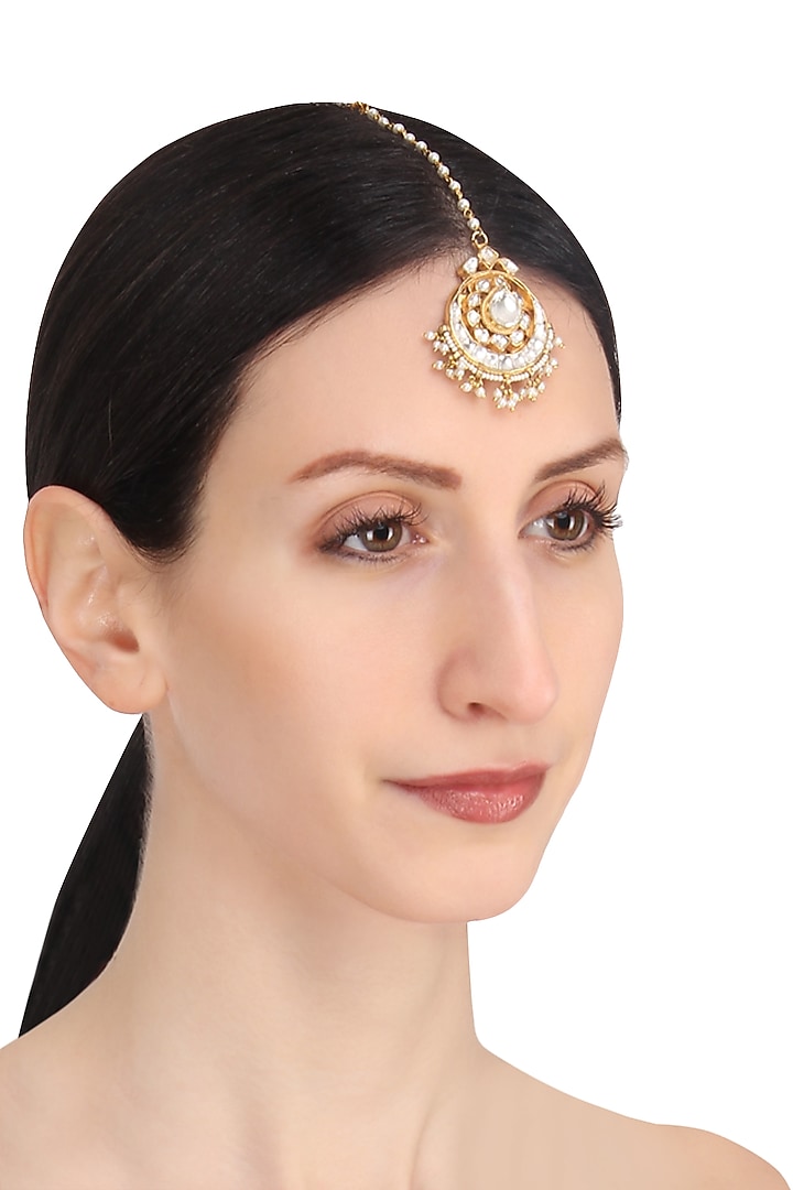 Riana Jewellery presents Gold plated white jadtar stone and pearl crescent maang tikka available only at Pernia's Pop Up Shop.