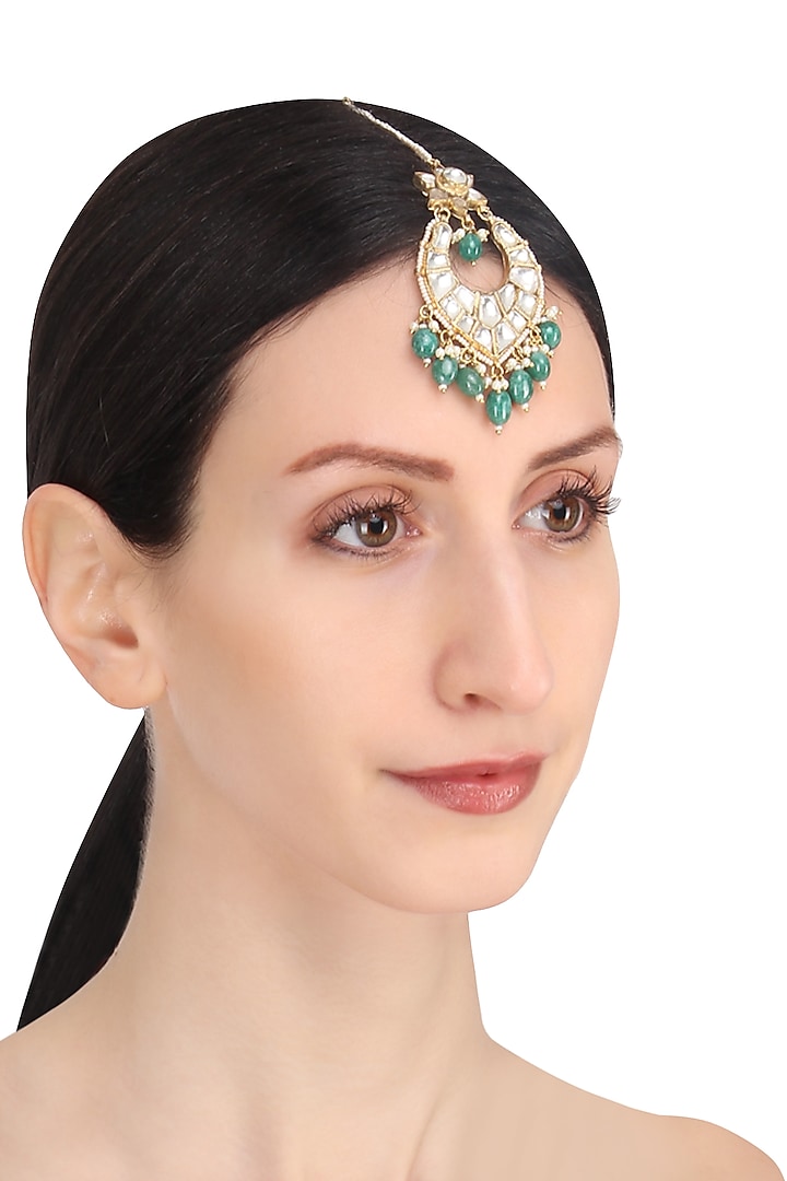 Riana Jewellery presents Gold plated white and green stone maang tikka available only at Pernia's Pop Up Shop.